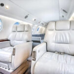 Thumbnail of white leather passenger seats of dassault falcon